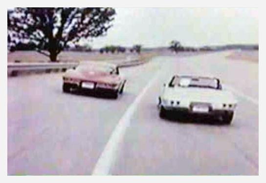 Dave MacDonald Dick Thompson and Zora Duntov in new 1963 Corvette Stingray