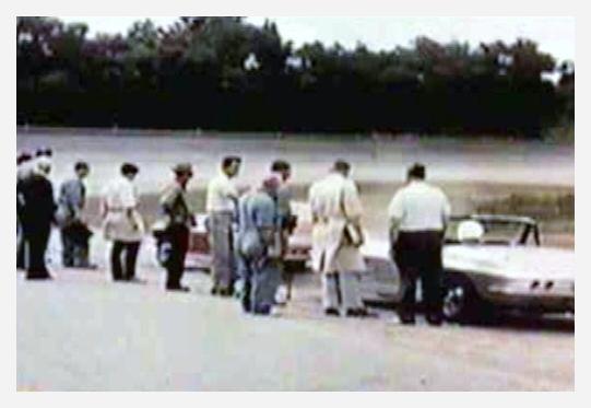 Dave MacDonald Dick Thompson and Zora Duntov in new 1963 Corvette Stingray